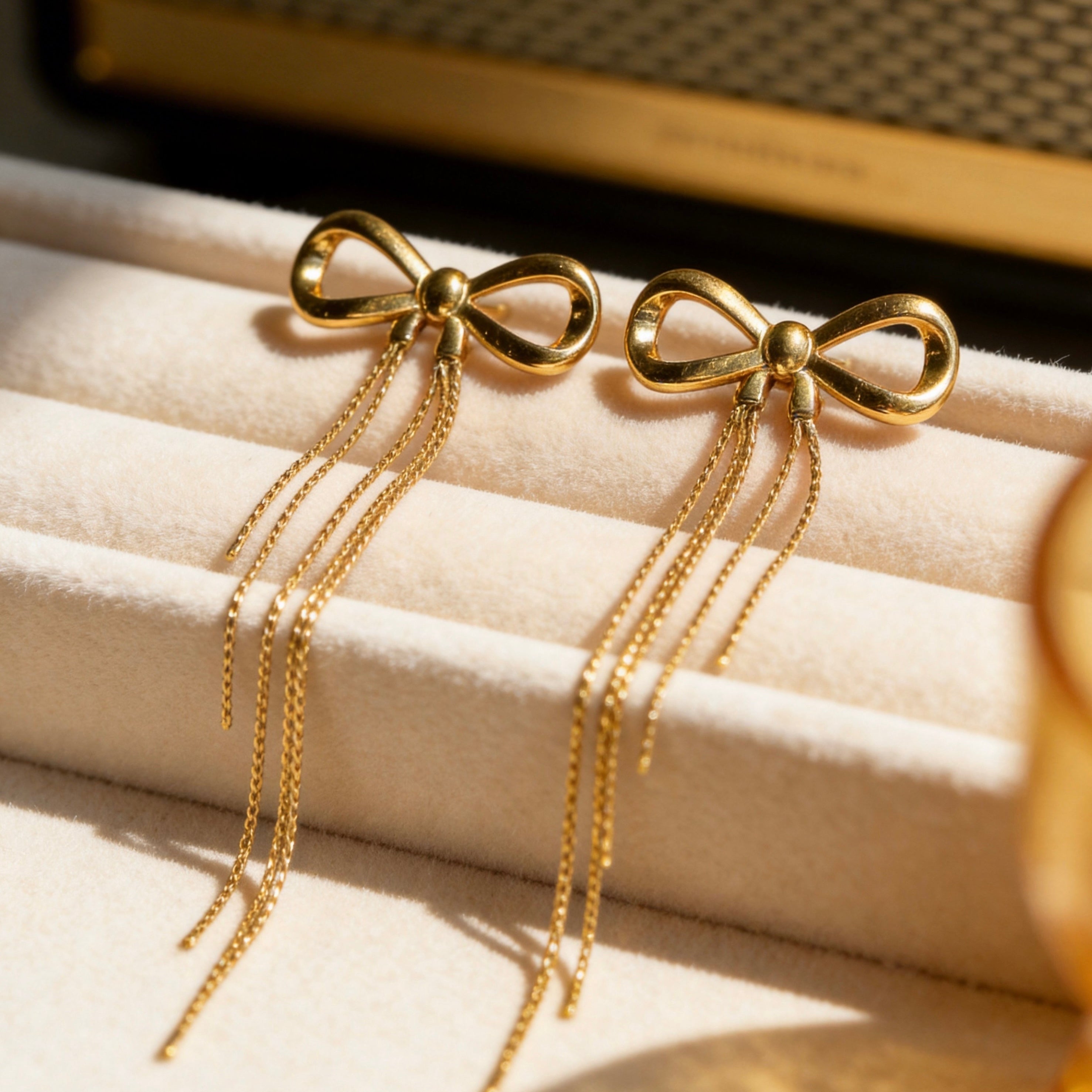 Gold Bow Tassel Chain Drop Earrings