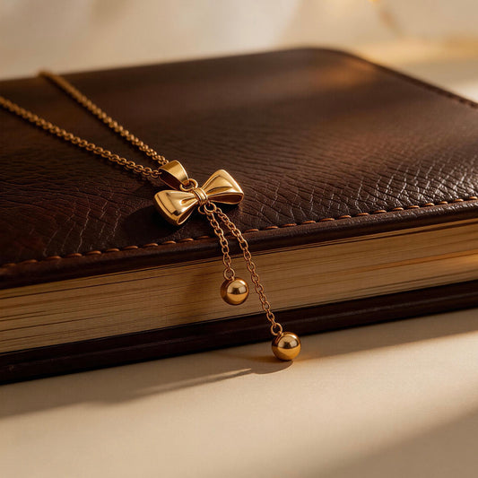 Gold Bow Tassel Pendant Necklace