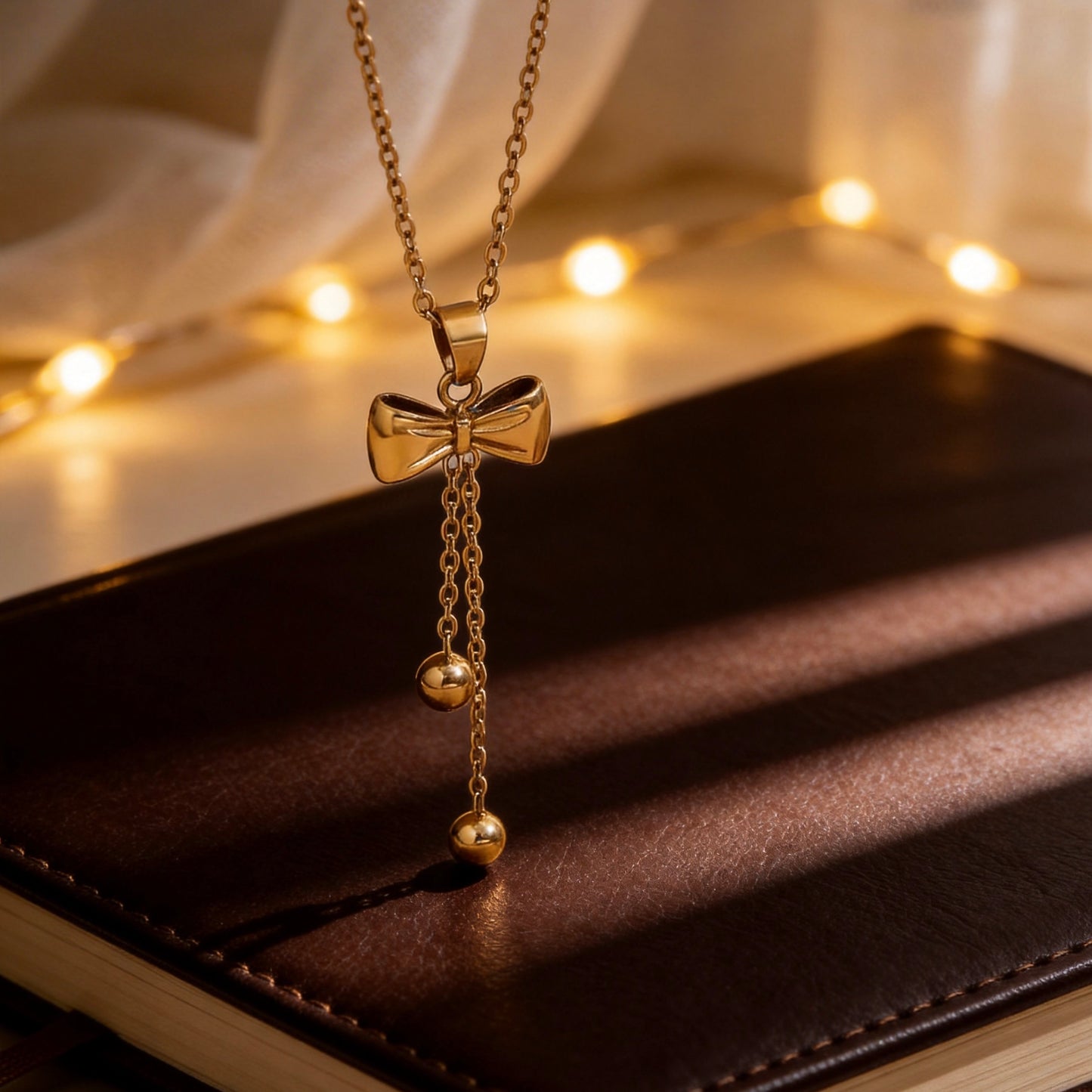 Gold Bow Tassel Pendant Necklace