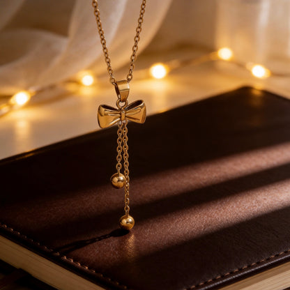 Gold Bow Tassel Pendant Necklace