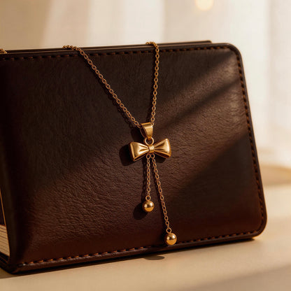 Gold Bow Tassel Pendant Necklace
