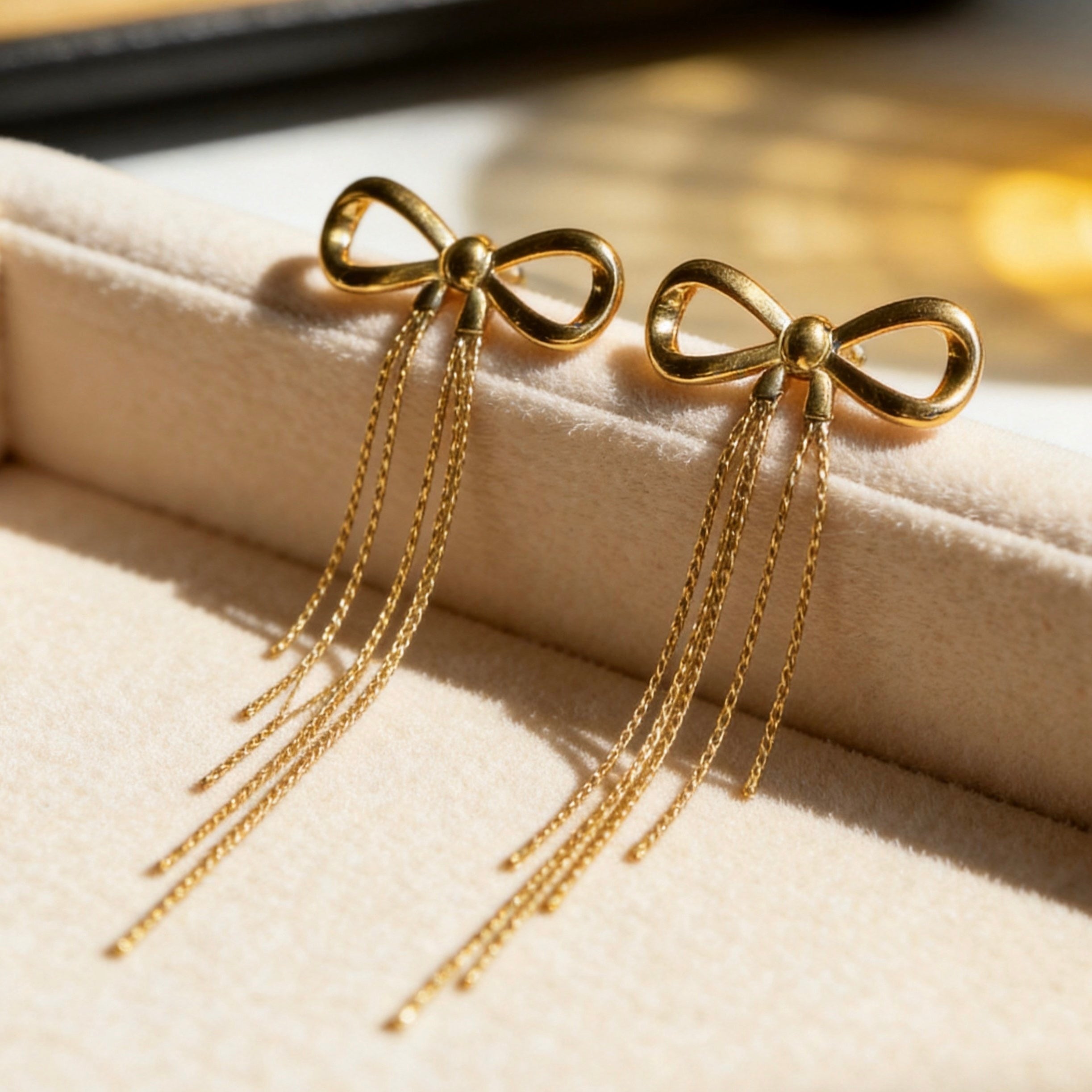 Gold Bow Tassel Chain Drop Earrings
