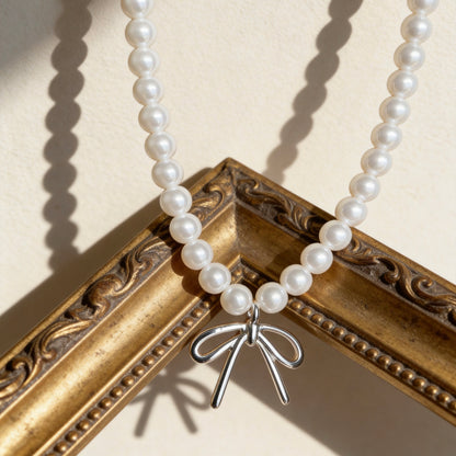 Pearl Necklace with Silver Bow