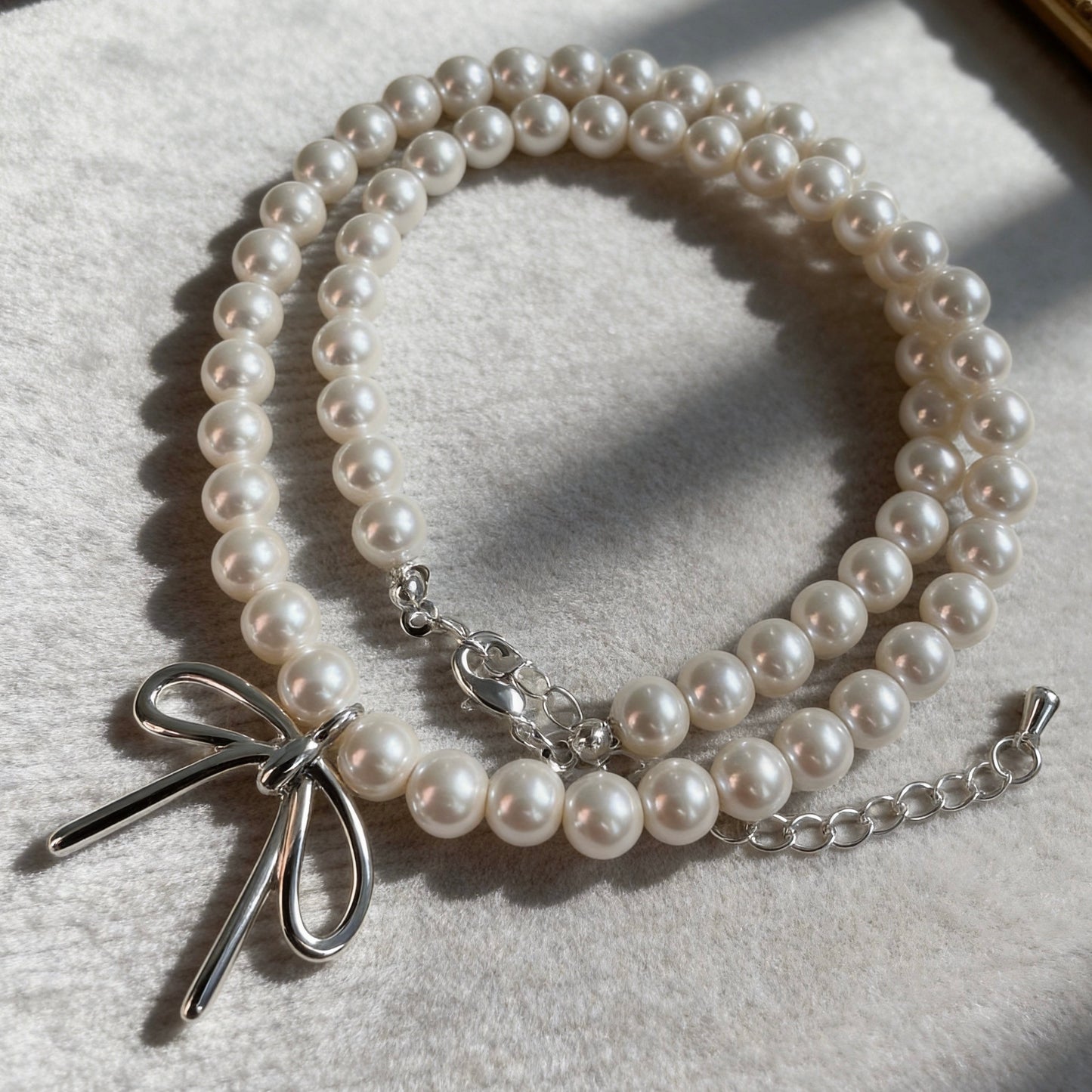 Pearl Necklace with Silver Bow