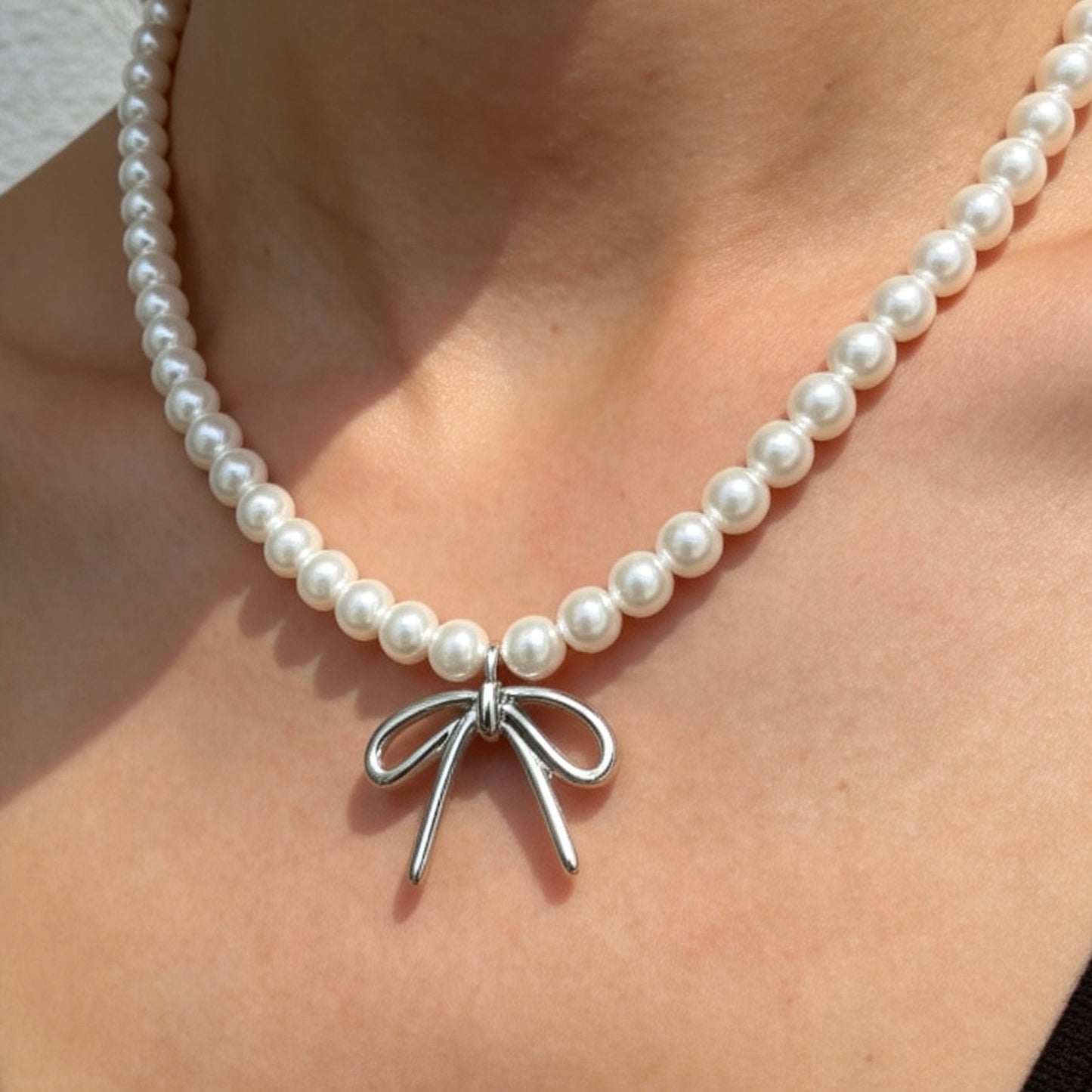 Pearl Necklace with Silver Bow