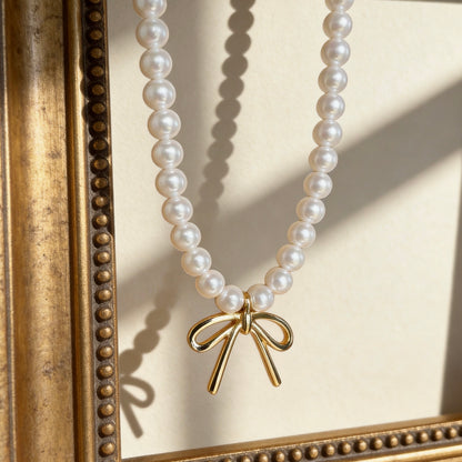 Pearl Pendant Necklace With Gold Bow