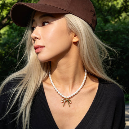 Pearl Pendant Necklace With Gold Bow