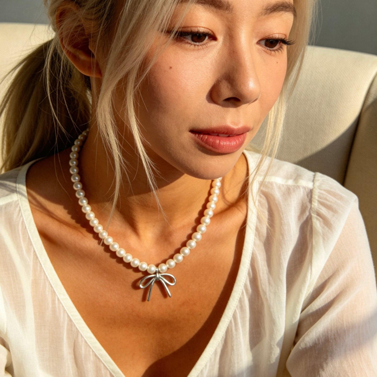 Pearl Necklace with Silver Bow